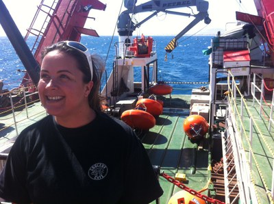 Tammy Morris  with moorings in background onboard the inaugural ASCA cruise